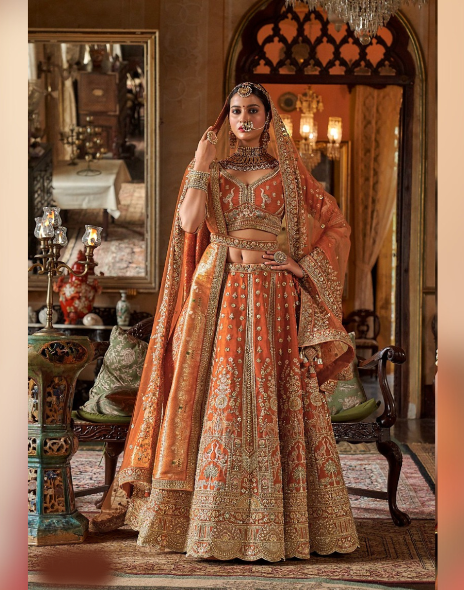 Vibrant Orange Bridal Silk Lehenga with Zari, Sequin, Pearl & Thread Embroidery Includes Blouse & Dual Dupatta Set Vibrant Orange Bridal Silk Lehenga with Zari, Sequin, Pearl & Thread Embroidery Includes Blouse & Dual Dupatta Set