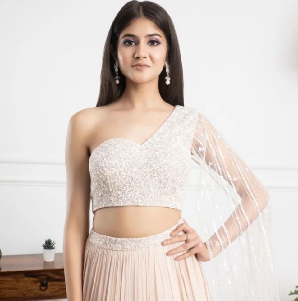 Designer Kanika Kapoor's Rose Pink Color Georgette Lehenga with Ruffle