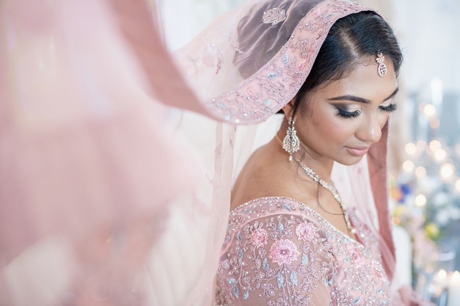 Bride wearing a rented Indian wedding dress