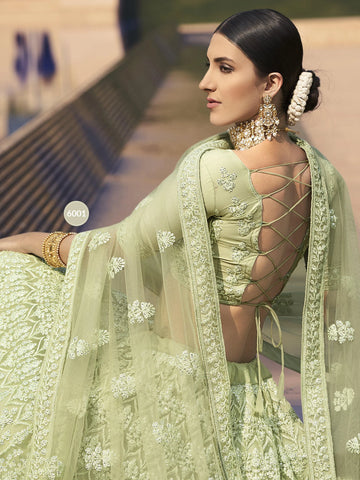 Green Soft Net Embroidered Lehenga - Rent