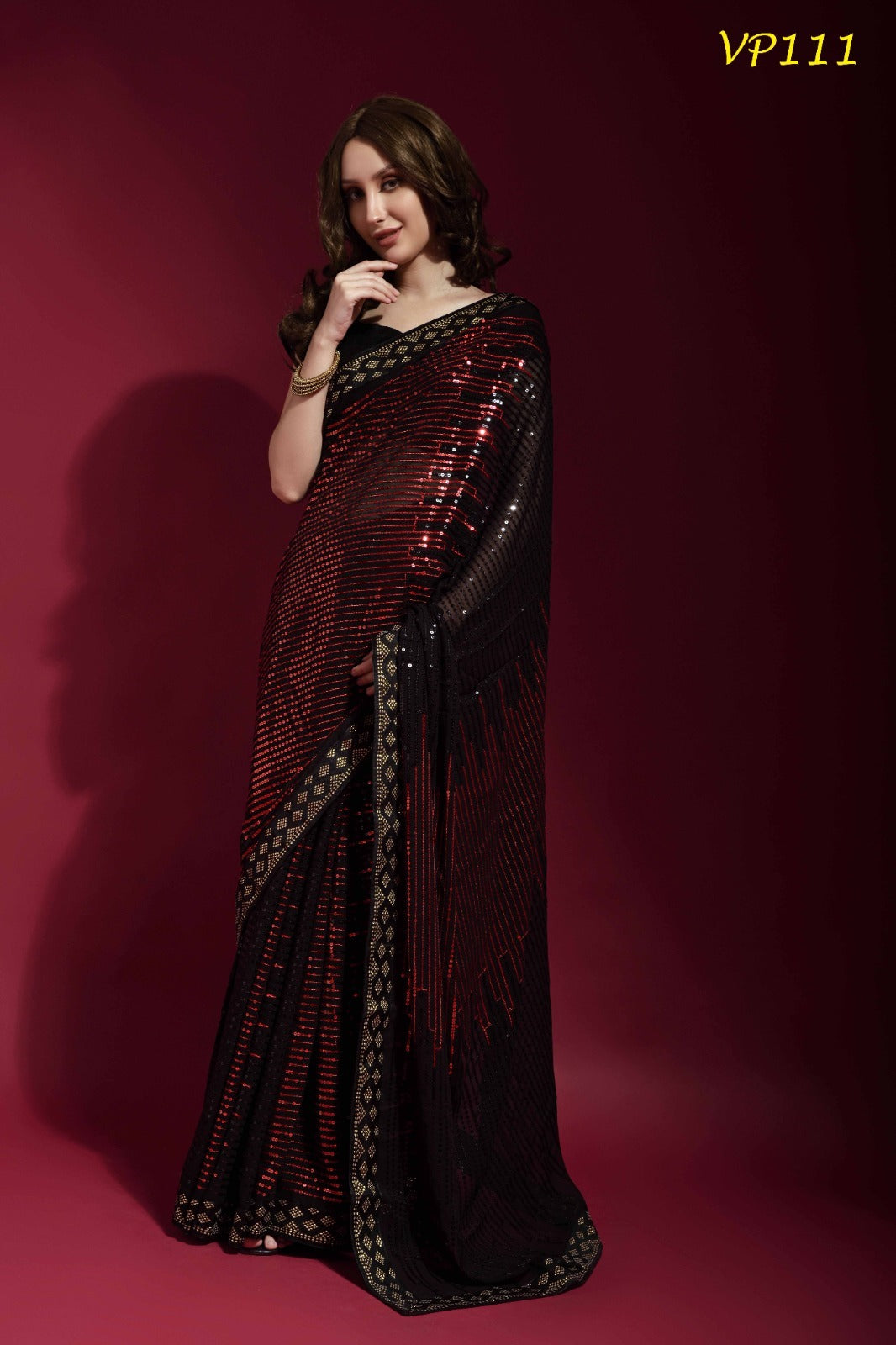 RED SEQUENCE WORK ON BLACK SAREE - RENT