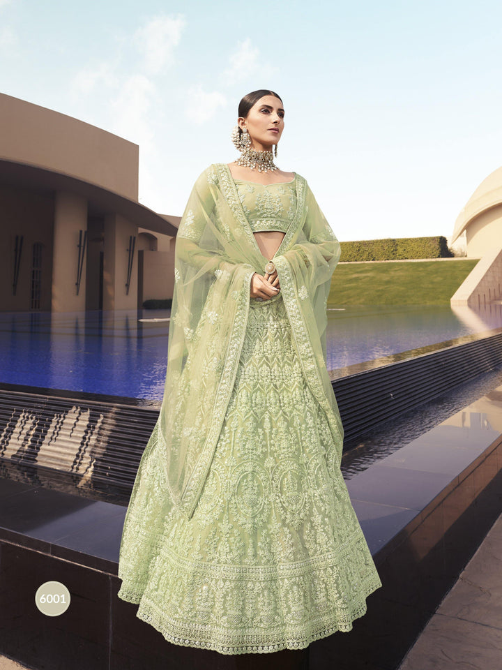 Green Soft Net Embroidered Lehenga Choli for Mehendi- Rent - Glamourental