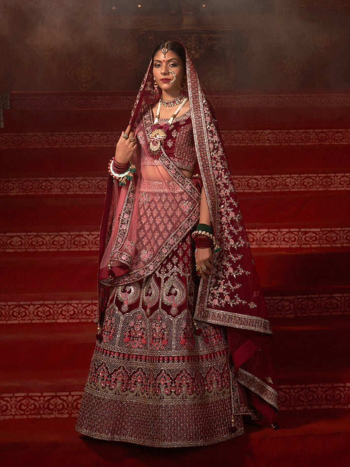 Maroon Heavy Embroidered Velvet Bridal Wear Lehenga Choli - Rent