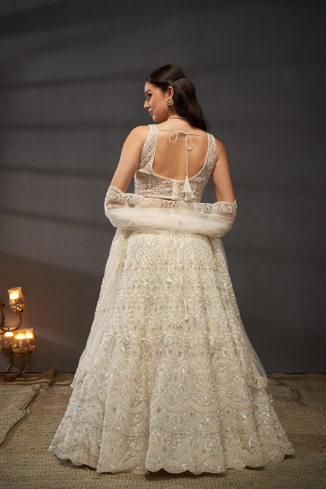 Awesome Cream Net Cutdana, Sequins and Zarkan  Lehenga choli & Dupatta - Rent.