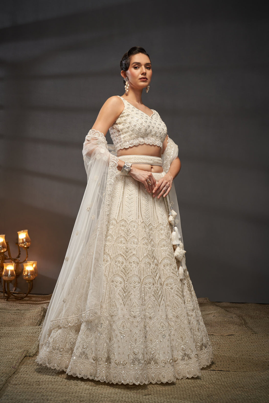 Awesome Cream Net Cutdana, Sequins and Zarkan  Lehenga choli & Dupatta - Rent