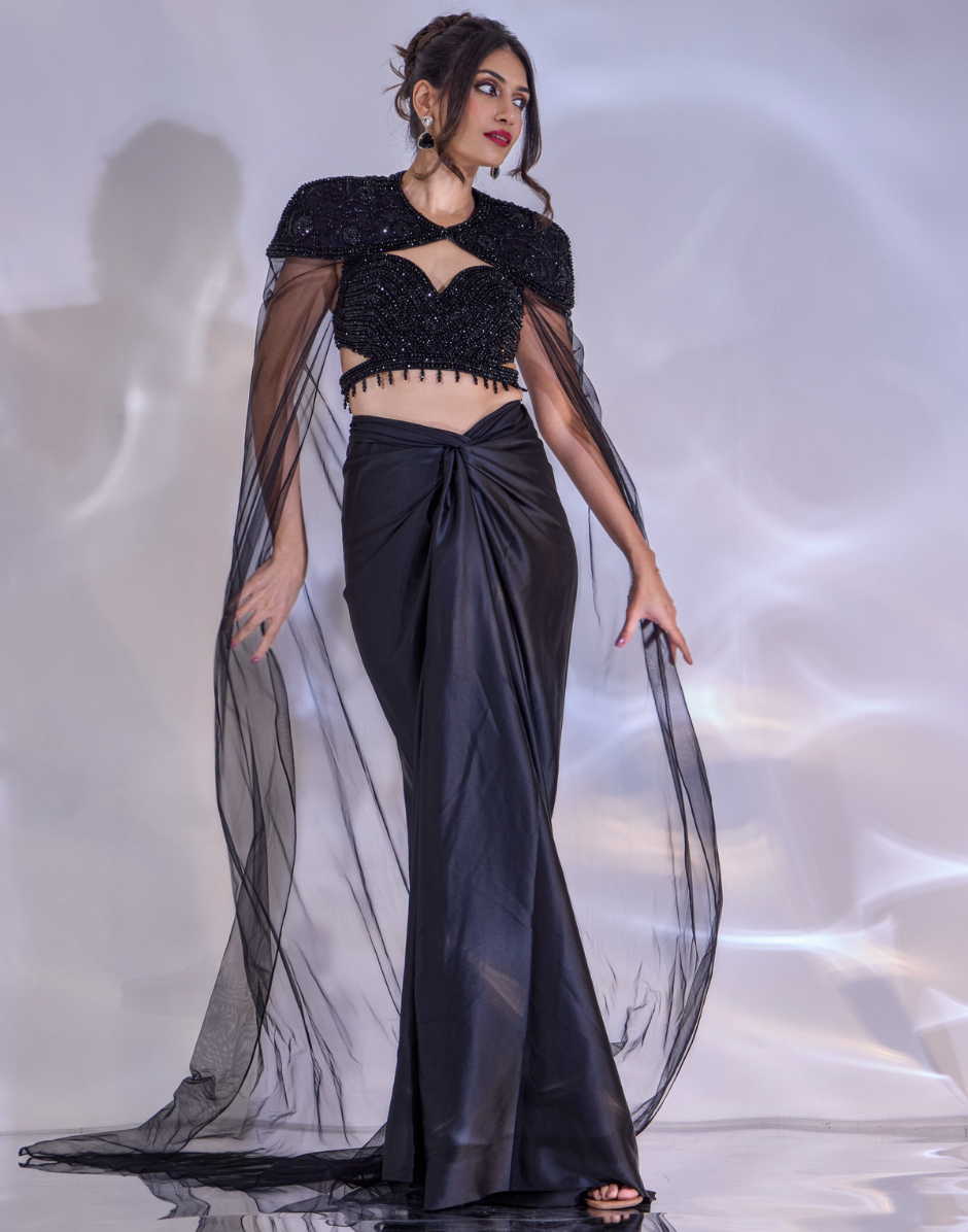 Black Embellished Jeevon Cape Set with Cut-Out Blouse, Satin Drape Skirt & Net Trail Cape