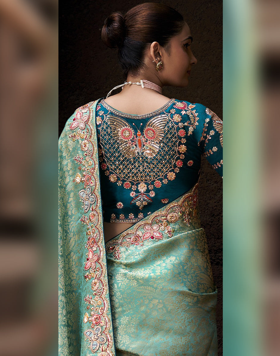 Effortless Elegance with Artistic Detailing Sea Green Designer Self-Design Embroidered Viscose Tissue Saree