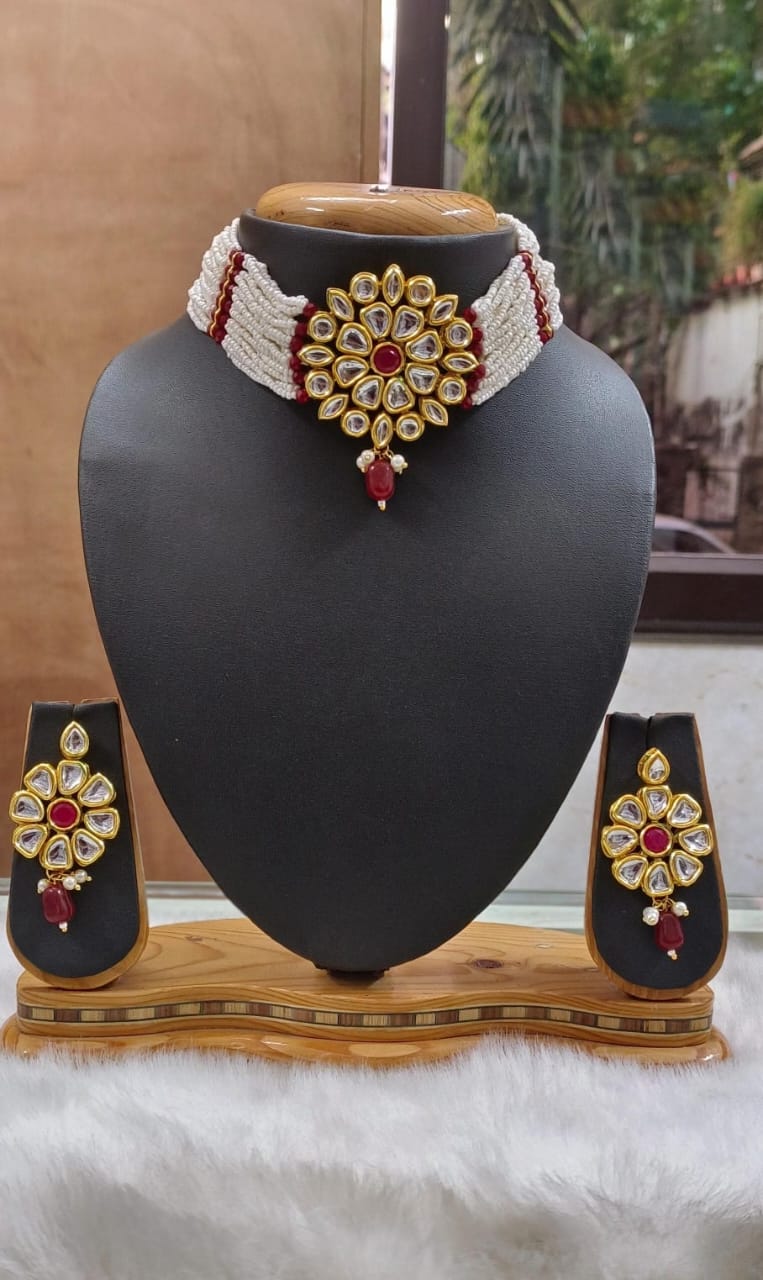 Elegant White Necklace with Red Stone Earrings - Rent