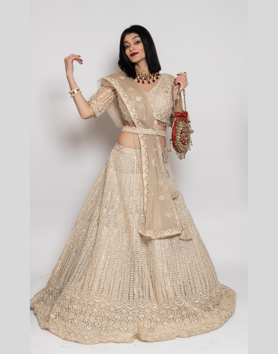 Exquisite Ivory Embroidered Sequins Net Lehenga Timeless Elegance for Weddings & Celebrations Ivory / XS / 7 Days Exquisite Ivory Embroidered Sequins Net Lehenga Timeless Elegance for Weddings & Celebrations Ivory / XS / 7 Days