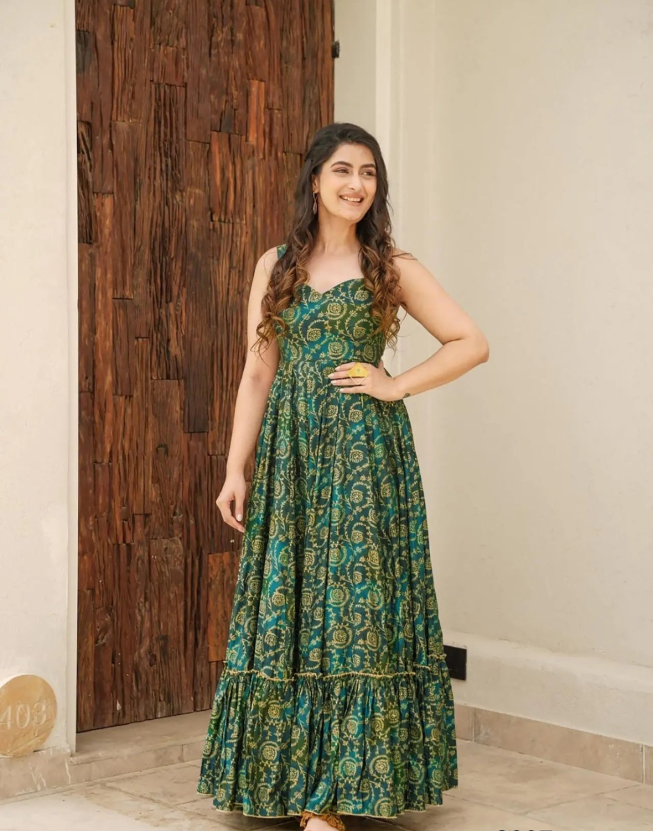 Fresh & Flowing Fully Flared Green Rayon Gown with Artistic Digital Pr