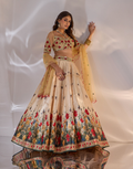 Gold Sona Silk Floral Lehenga with Embroidered Net Blouse & Dupatta Featuring Tassels