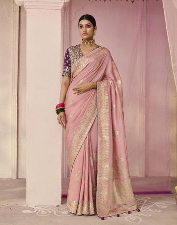Graceful Blush Pink Dola Silk Saree Featuring Intricate Flower Motif Weaving