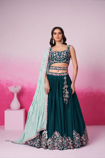 Exquisite Teal Pure Georgette Lehenga Choli with Sequins  - Rent Now