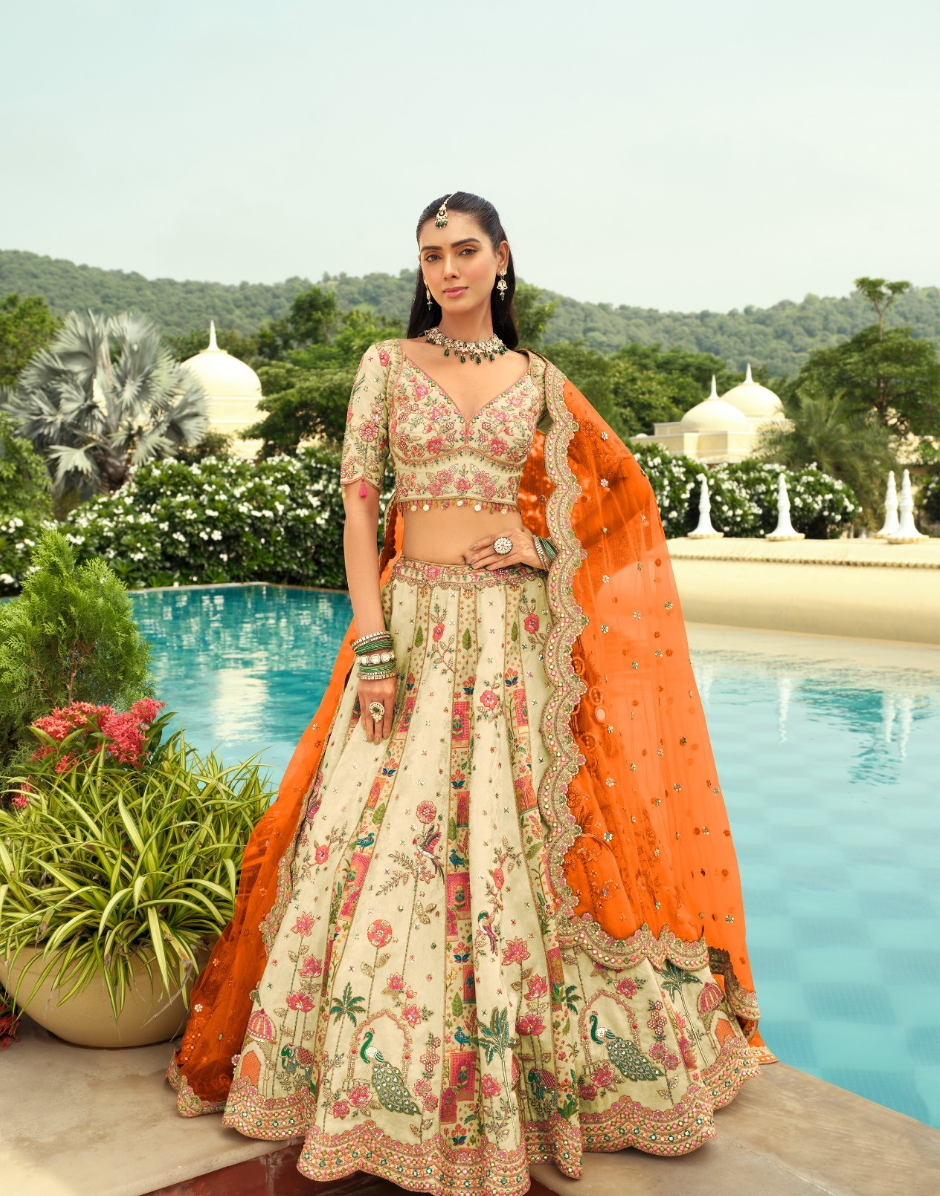 Handcrafted Silk Lehenga Blouse with Heavy Embroidery, Butti Weaving & Art Mirror Highlights Net Dupatta Set - Buy