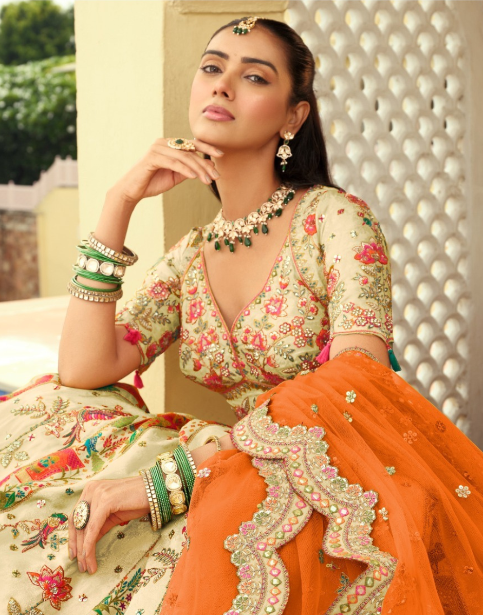 Handcrafted Silk Lehenga Blouse with Heavy Embroidery, Butti Weaving & Art Mirror Highlights Net Dupatta Set - Buy