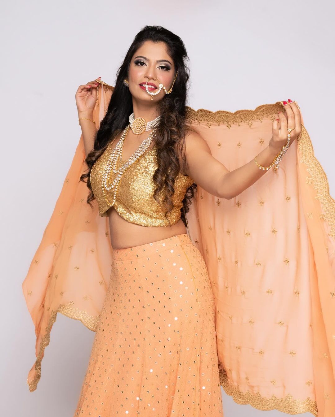 Gold Sequin Blouse with Orange Mirror Work Lehenga - Rent