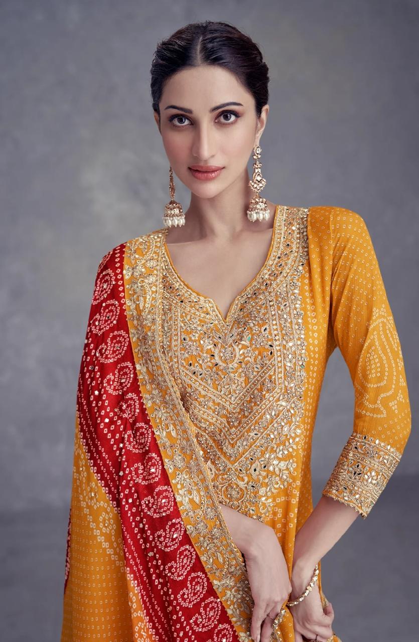 Radiant Yellow and Red Embroidered Salwar Suit - Rent