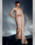Luxurious Beige Tissue Organza Saree with Embellished Border Featuring Moti, Cutdana & Khatli Work