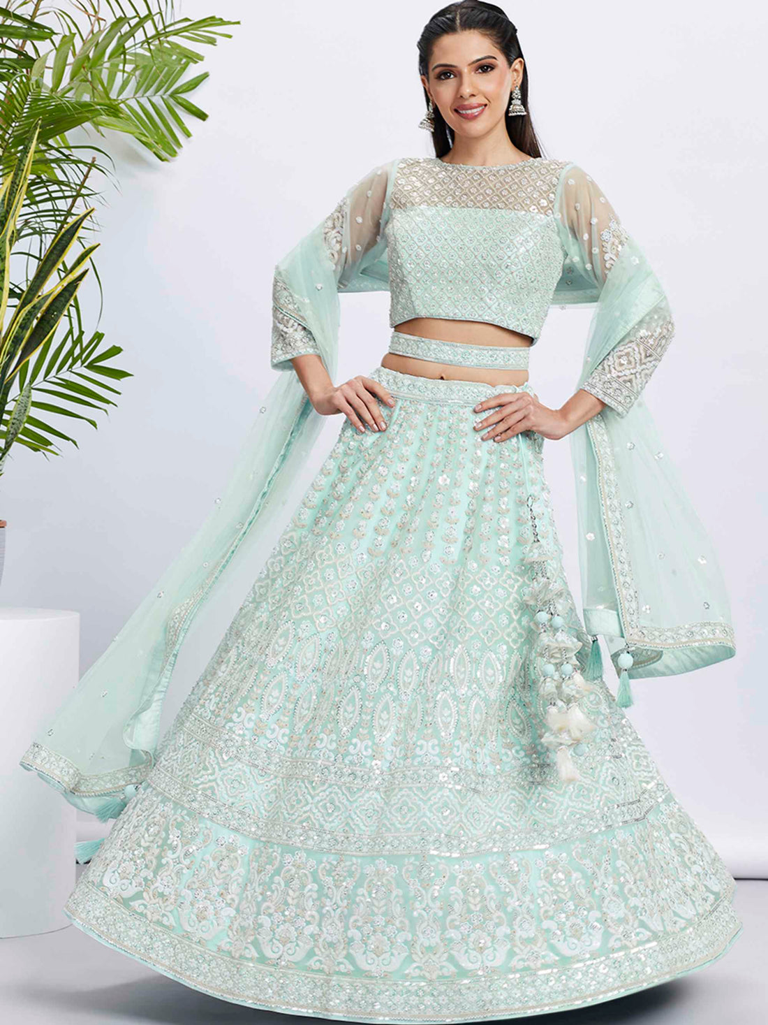 Luxurious Sea Green Pure Georgette Lehenga Choli with Sequins - Rent