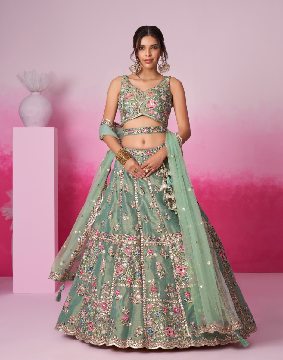 Luxury Designer Lehenga Set in Net with Heavy Embroidery Moti, Sequins, Mirrors & Signature Tassels