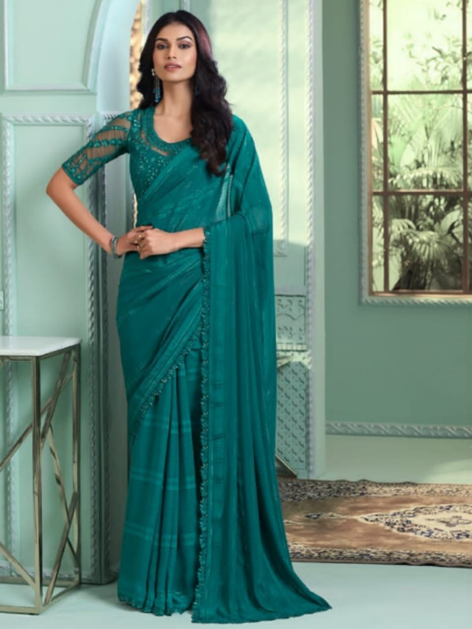 Moonlit Grace Teal Georgette Saree - Rent