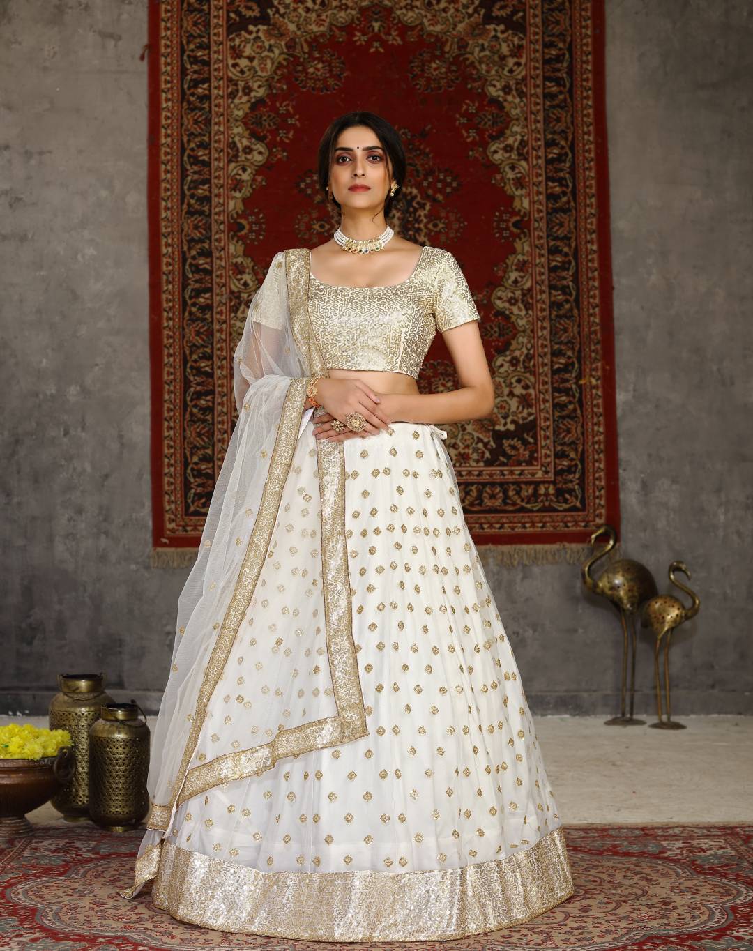 Off White Golden Embroidered Net Lehenga