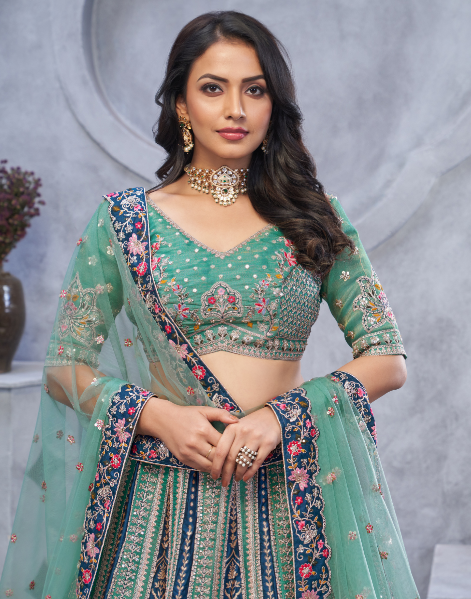 Organza Silk Intricate Paisley Motifs Traditional Embroidered Wedding Lehenga Choli With Soft Net Dupatta