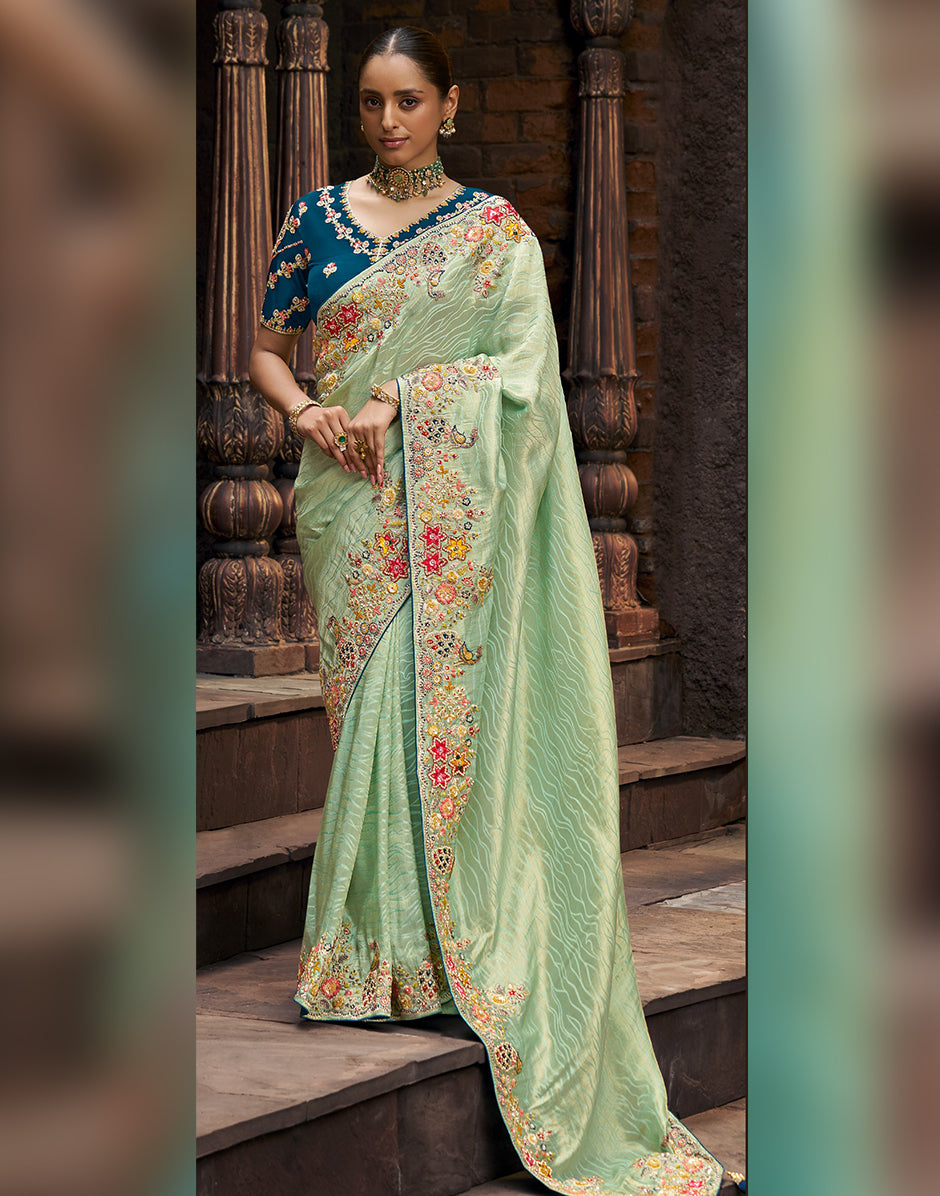 Perfect Blend of Sophistication and Artistry Green Designer Self-Design Embroidered Viscose Tissue Saree