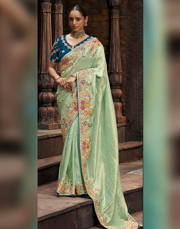 Perfect Blend of Sophistication and Artistry Green Designer Self-Design Embroidered Viscose Tissue Saree