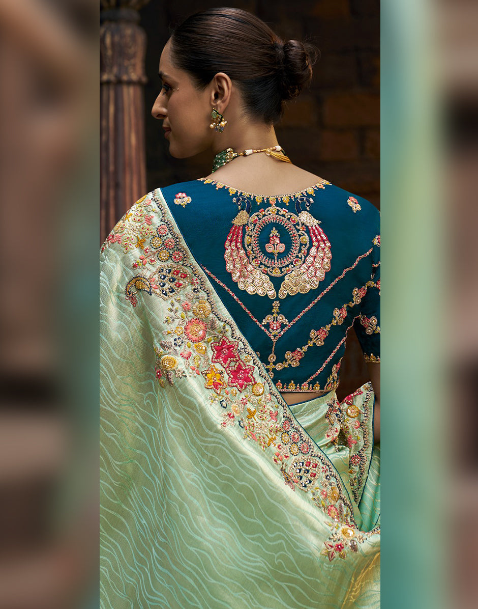 Perfect Blend of Sophistication and Artistry Green Designer Self-Design Embroidered Viscose Tissue Saree