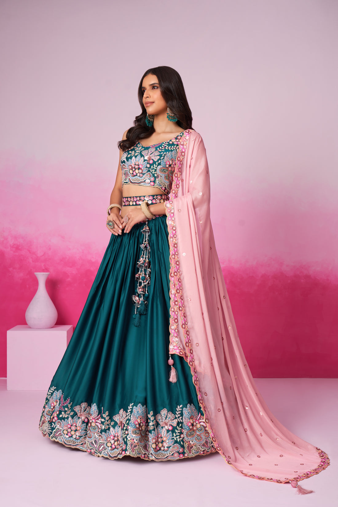 Exquisite Teal Pure Georgette Lehenga Choli with Sequins  - Rent Now