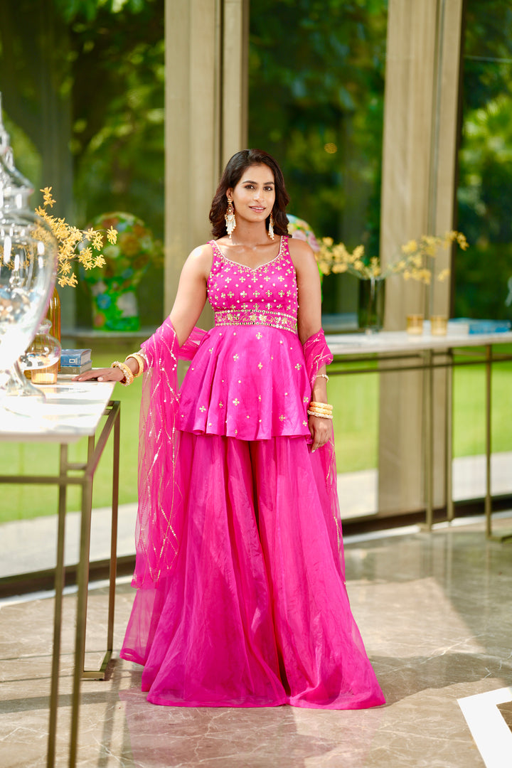 Rashika Sharma's Pink Nyasa Silk peplum kurta with organza gharara RAYA set - Rent