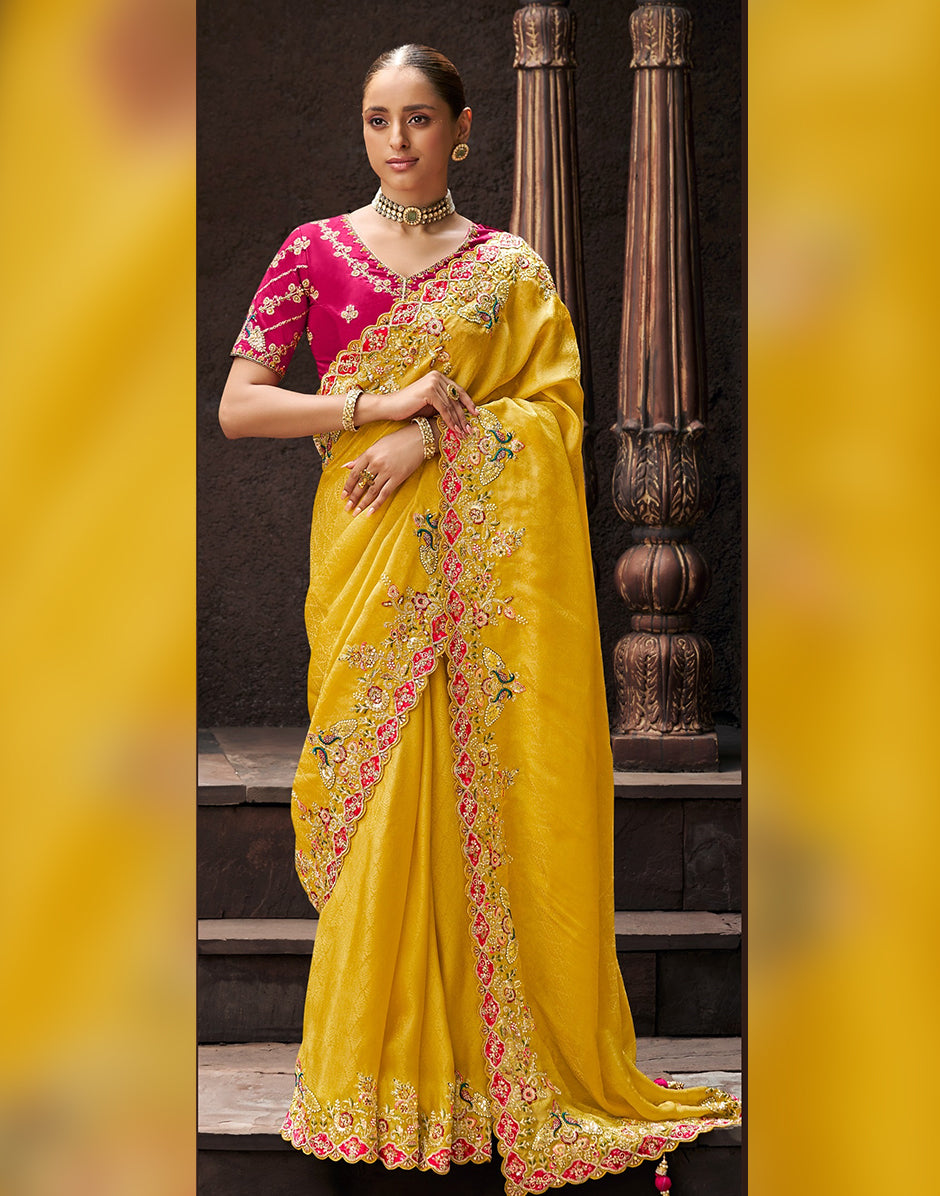 Radiant Elegance with Subtle Craftsmanship Yellow Self-Design Embroidered Viscose Tissue Saree