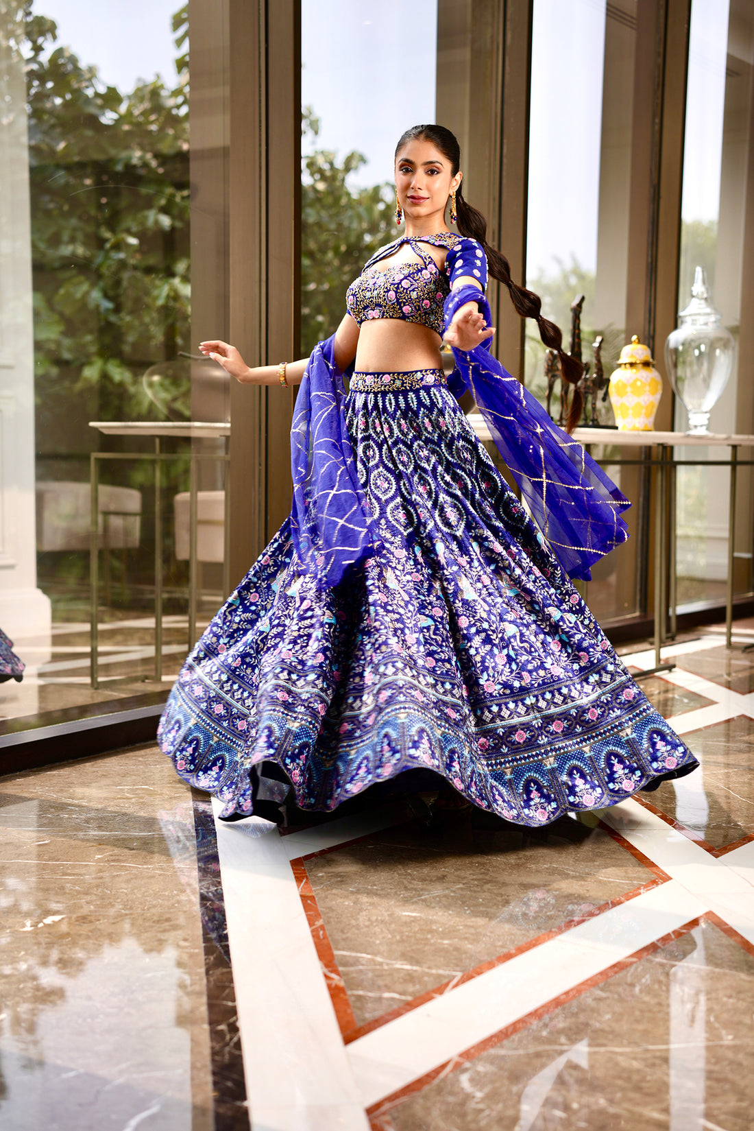 Rashika Sharma's Blue Printed Velvet Shriya Lehenga with hand embroidered cut out blouse- Rent