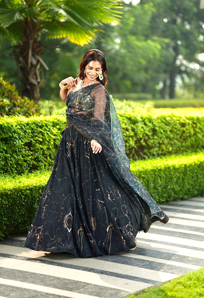 Rashika Sharma's black printed georgette MEESHA Lehenga with hand embroidred Chiffon Blouse - Rent