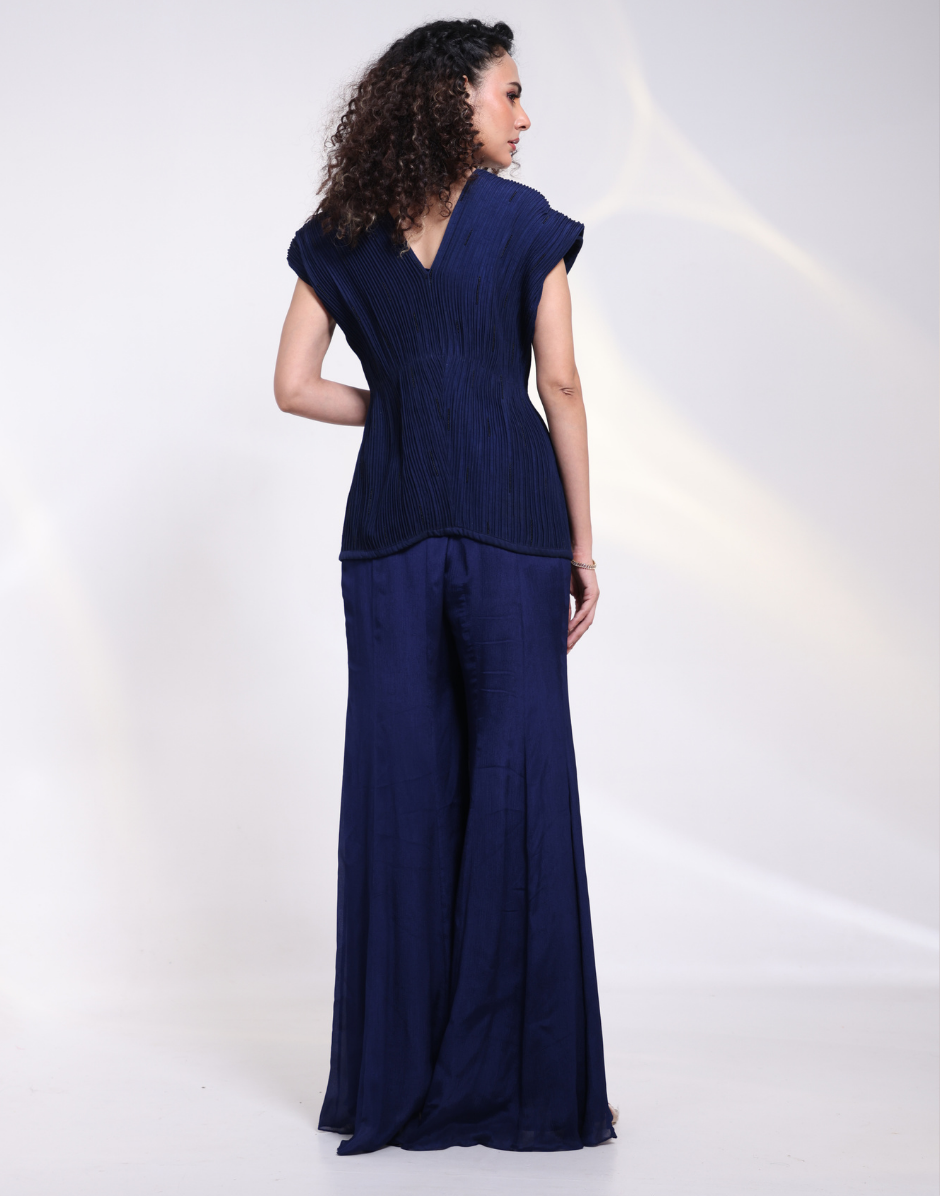 Stylish Blue Three-Piece Set with Bustier, Flared Pants & Structured Overlay_3
