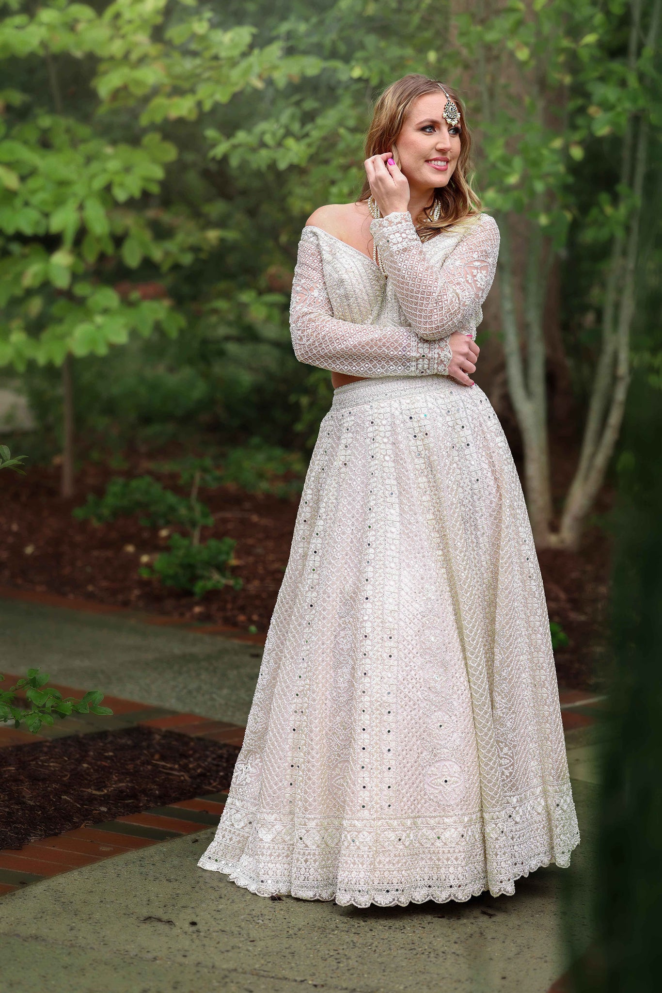 Adoring Wedding Wear Hand Embroidered White Bridal Lehenga - Rent