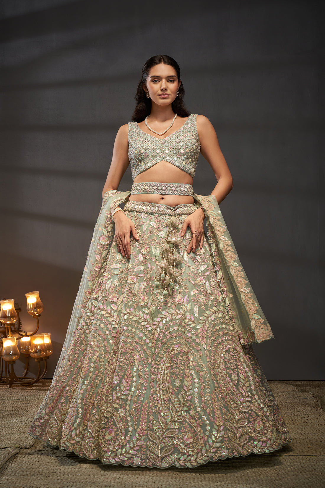This Golden pure georgette sequins and thread work lehenga, choli, and dupatta