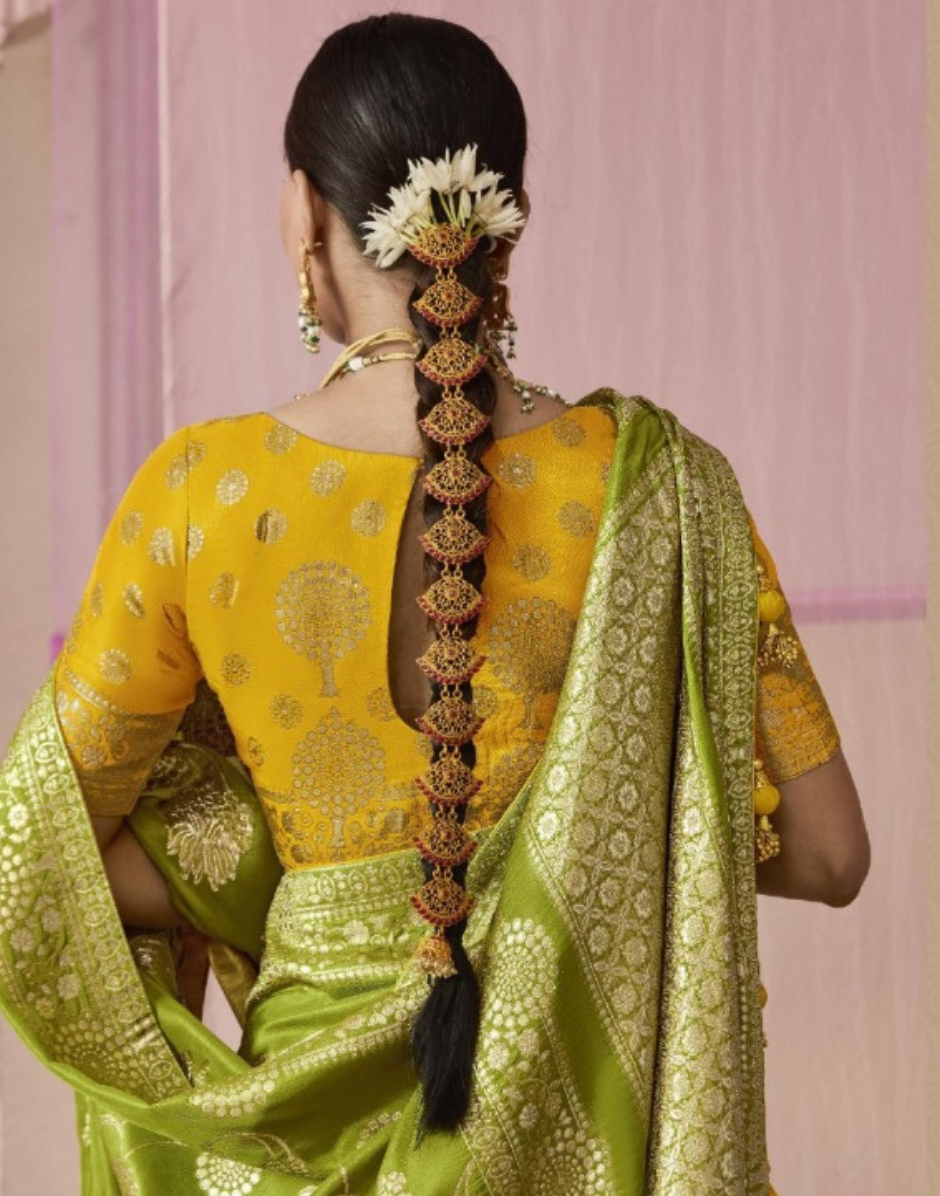 Timeless Mehendi Green Dola Silk Saree Featuring All Over Floral Weaving