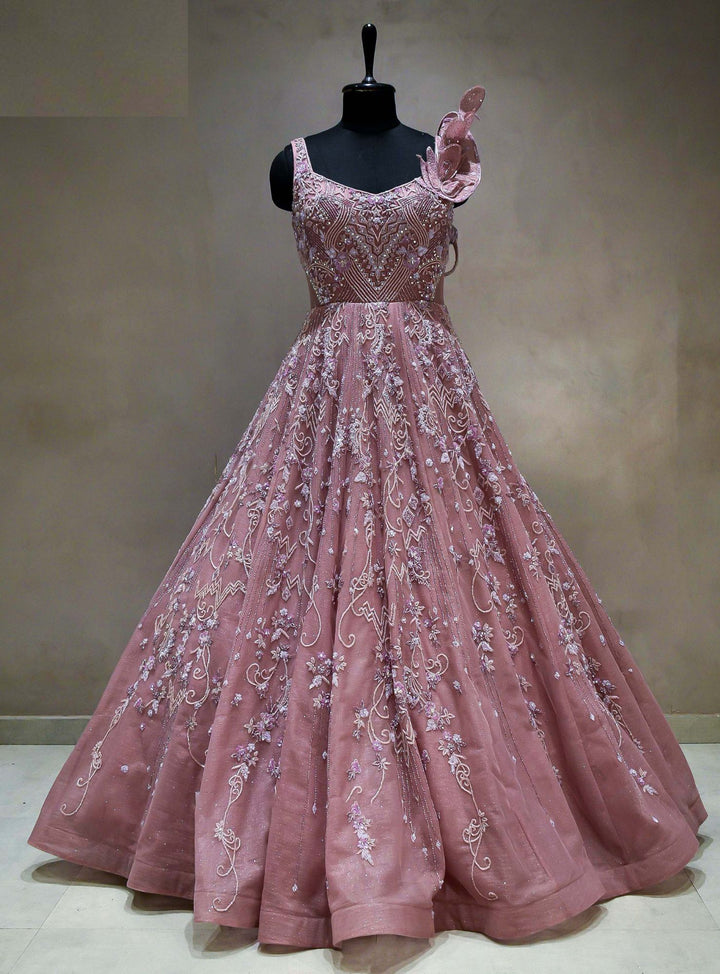 Meraj couture's Onion Pink Ruffled Gown - RENT