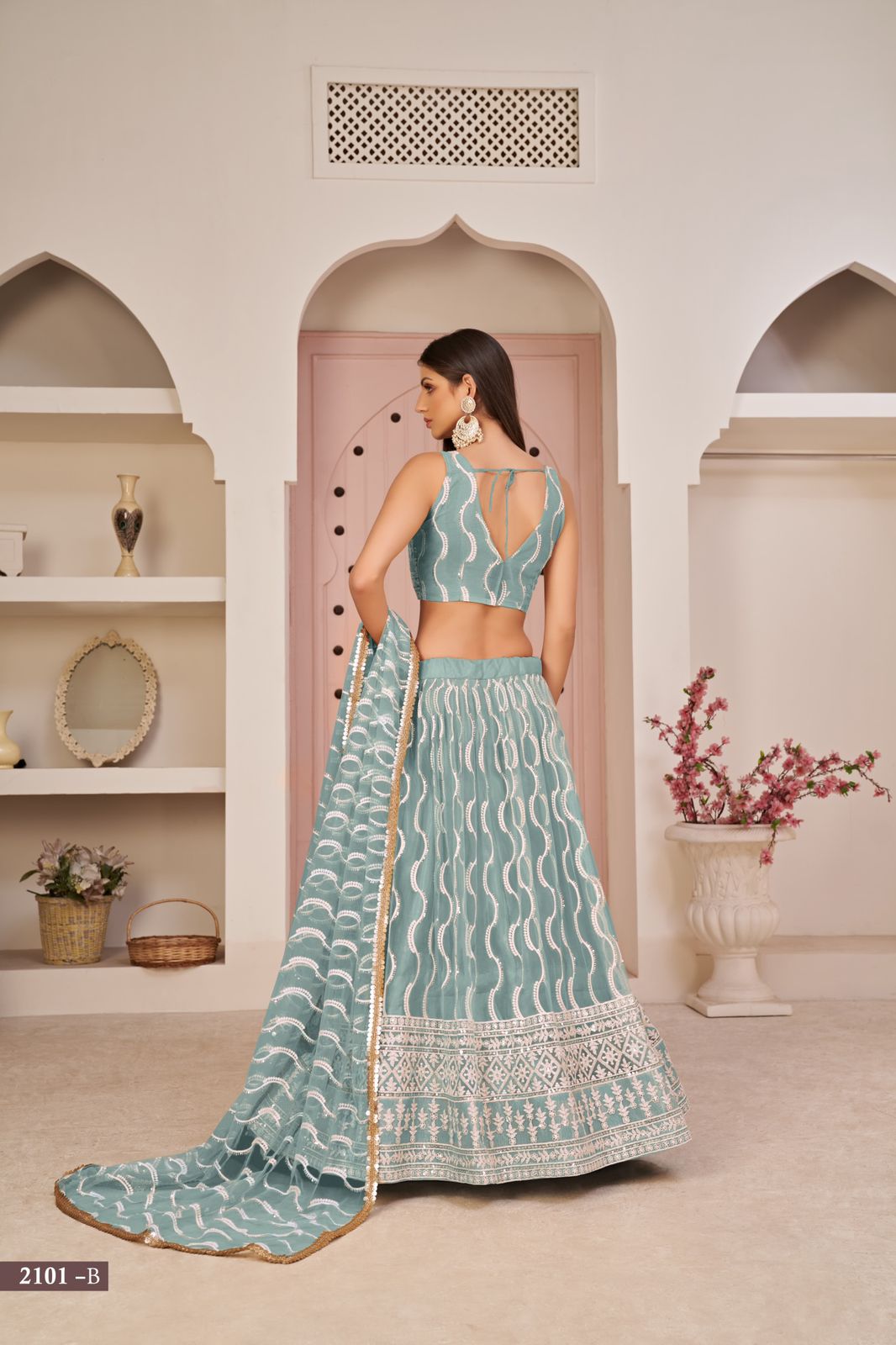 Powder Blue  Uniquely Designed Heavy Embroidered Lehenga Set - Rent