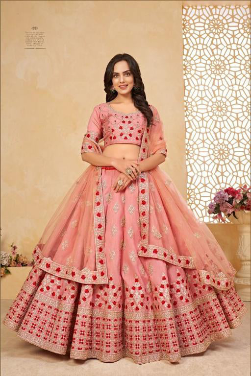 Beautiful Pink colored Heavy embroidered Lehenga Set - Rent