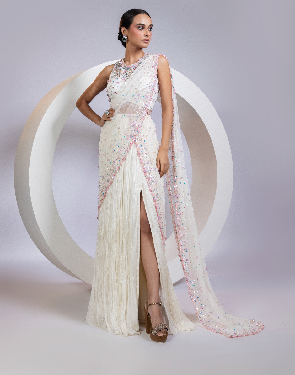 White Pre-Draped Saree with Embellished Blouse and Pastel Sequin Detailing 