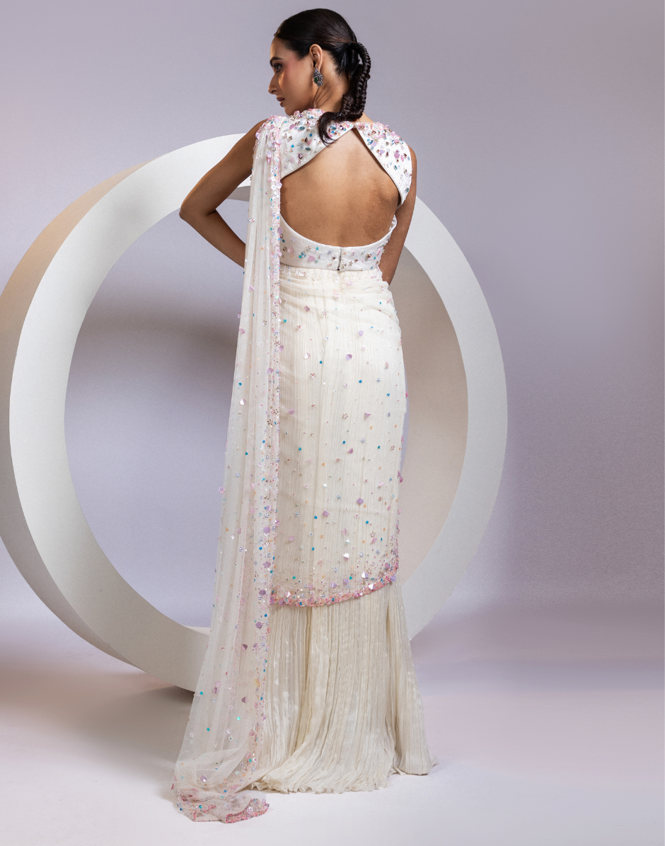 White Pre-Draped Saree with Embellished Blouse and Pastel Sequin Detailing _1
