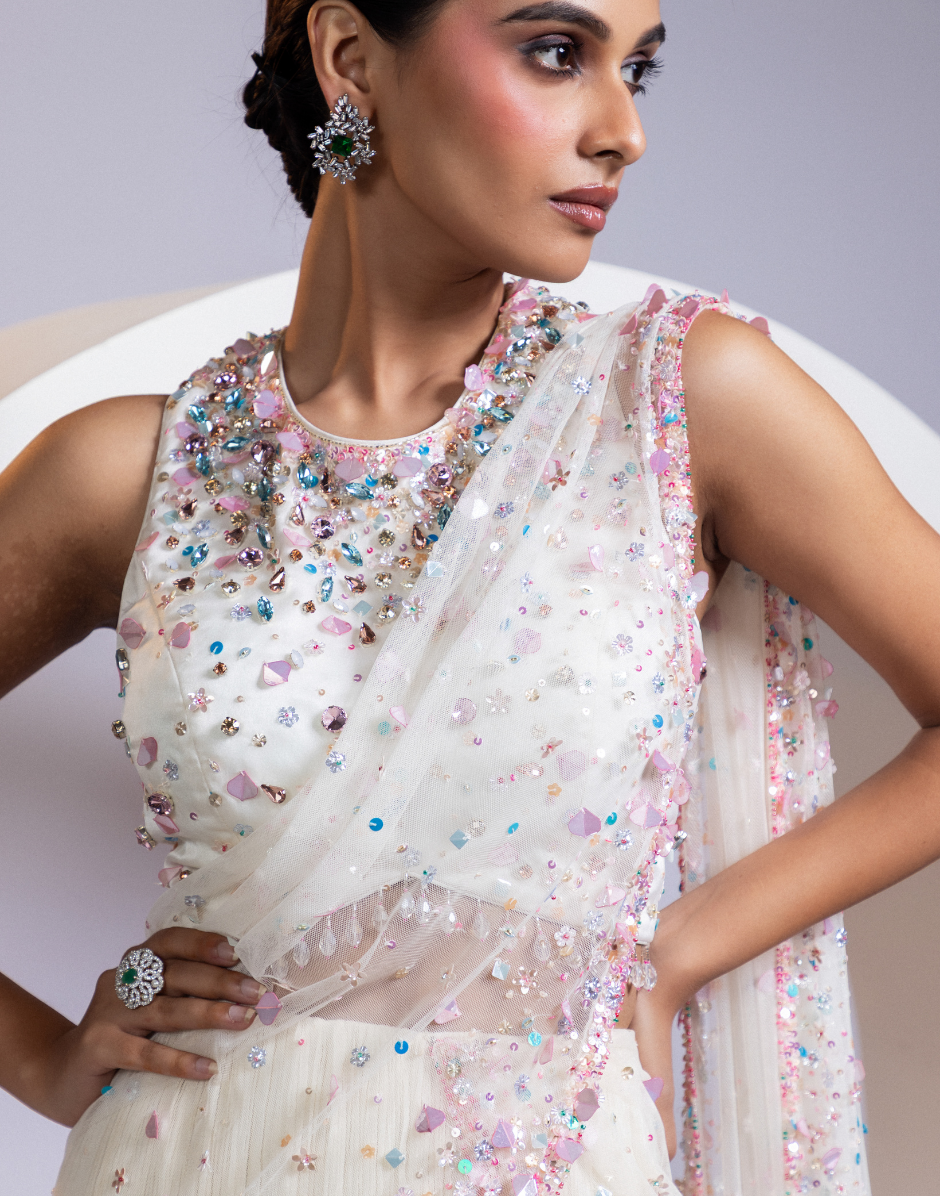 White Pre-Draped Saree with Embellished Blouse and Pastel Sequin Detailing _3