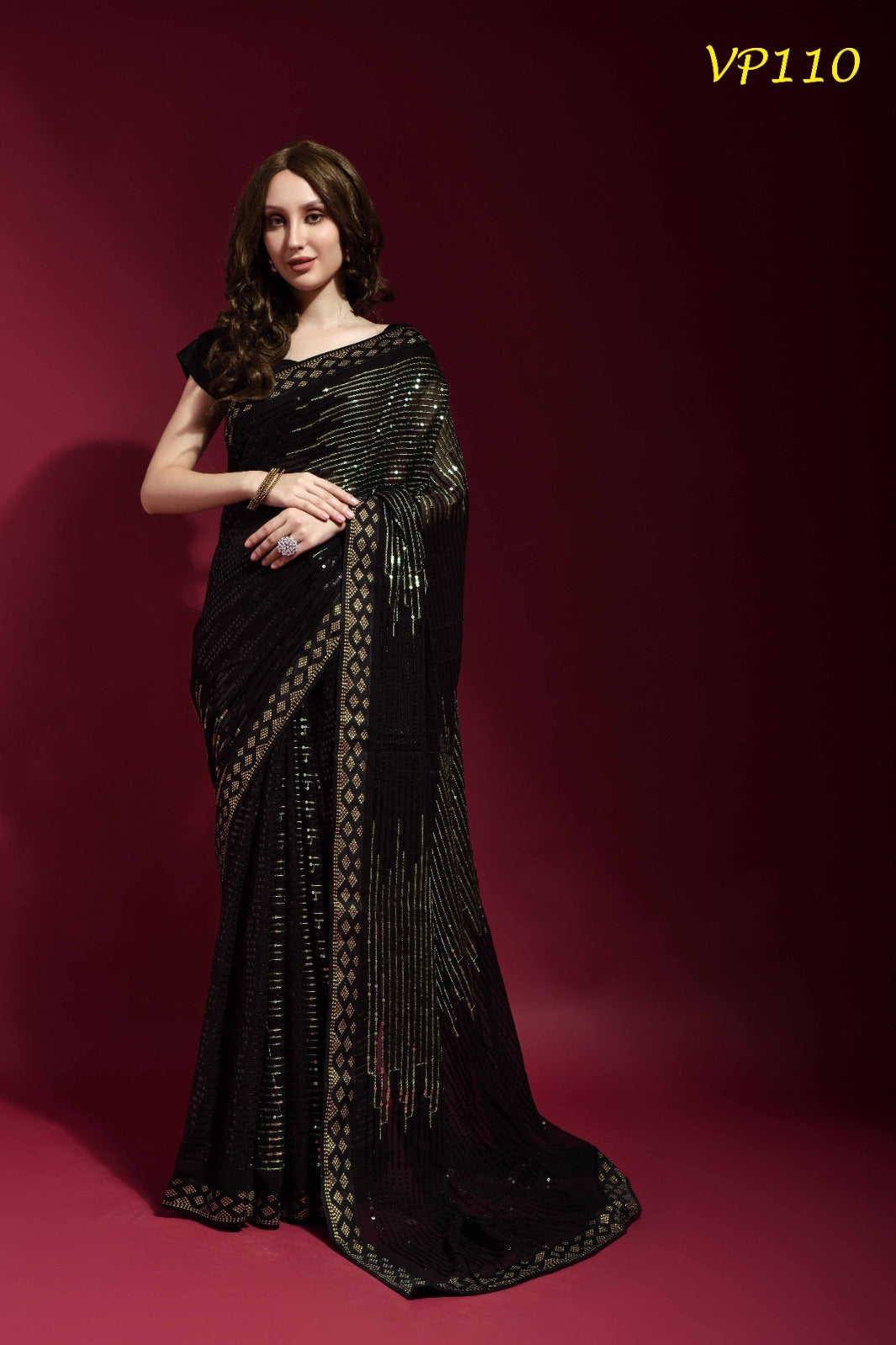 GOLD SEQUENCE WORK ON BLACK SAREE - RENT