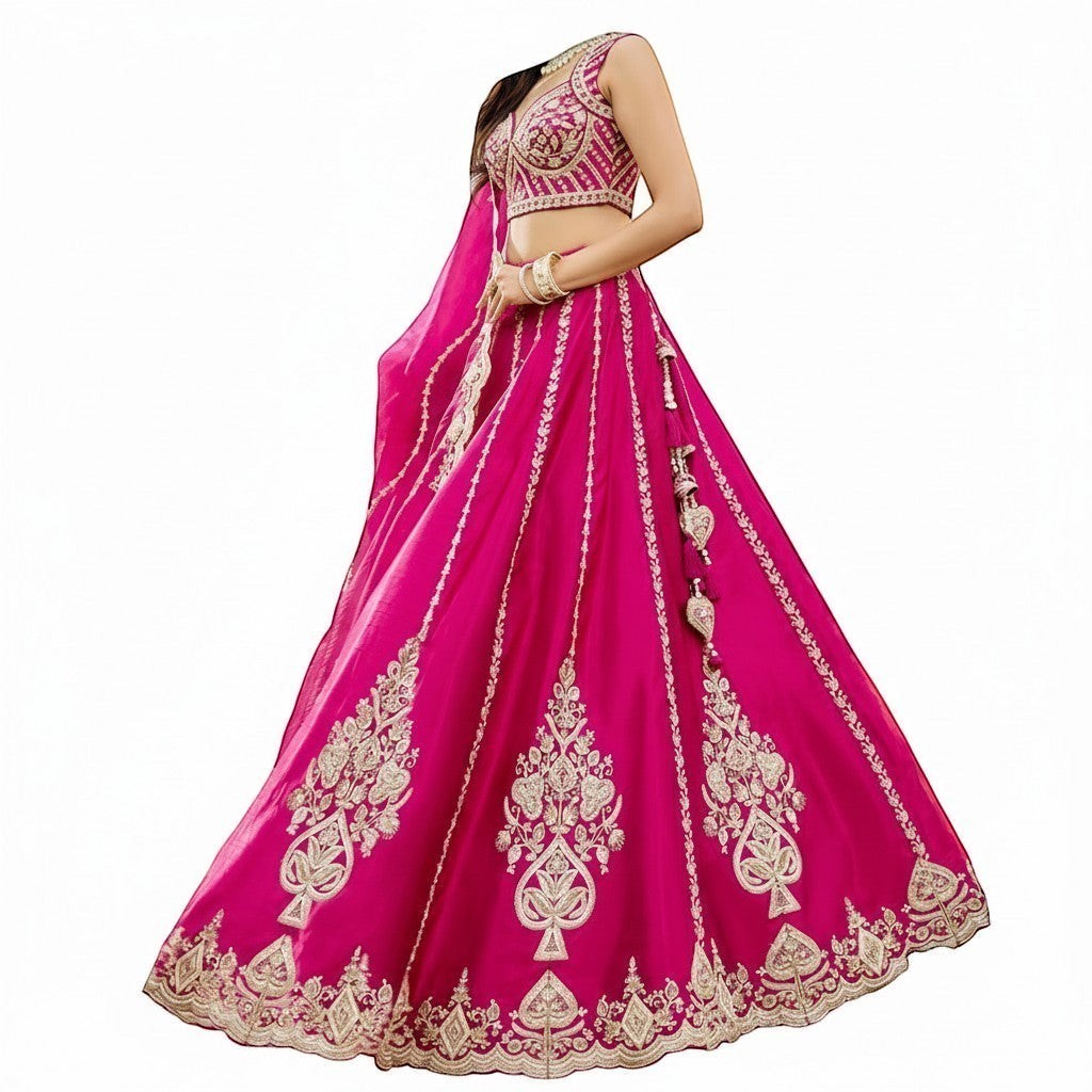 Glamourental fuchsia silk lehenga choli set with intricate white bead and sequin embroidery, tassels, and designer dupatta.