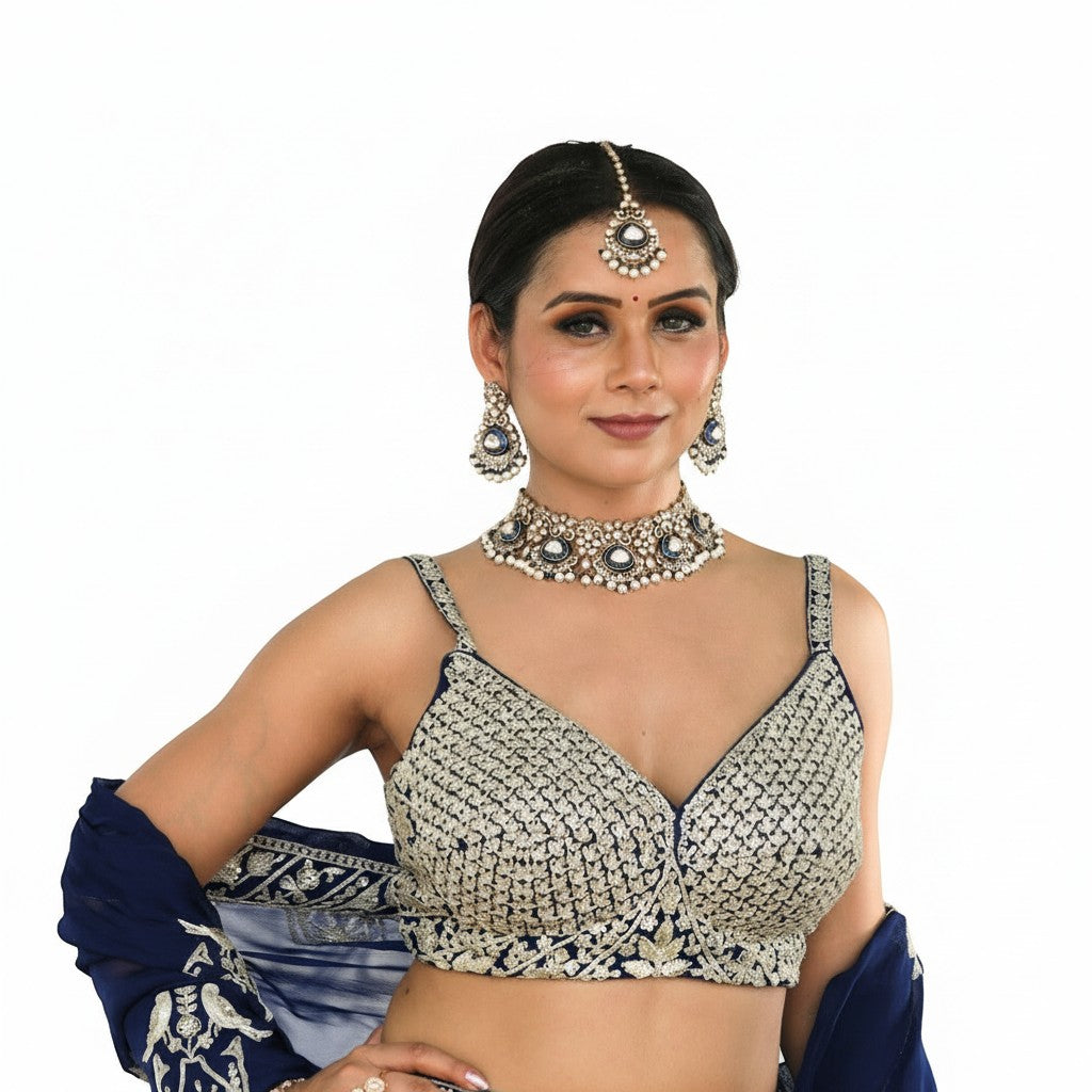 Glamourental Royal Navy embellished embroidered lehenga set with blouse and dupatta. Features intricate silver embroidery and beadwork.