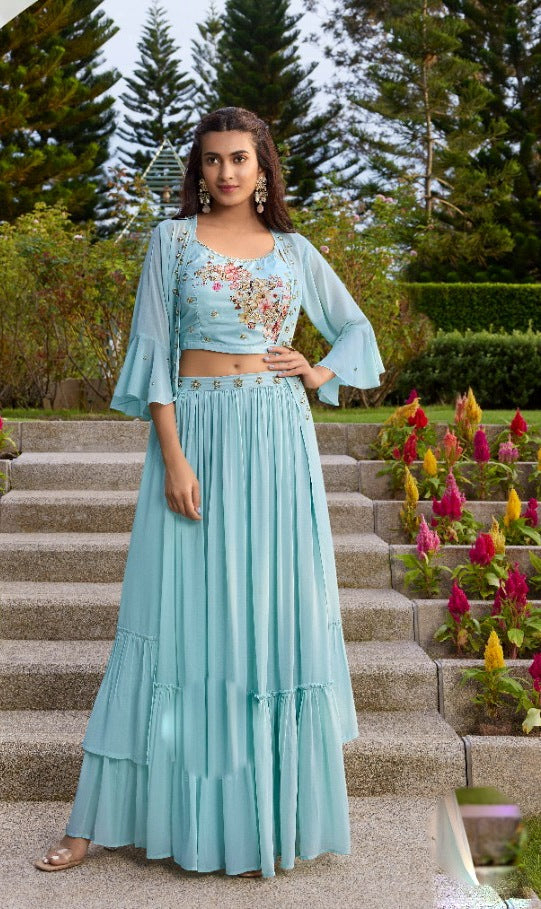 Sky blue colored Embroidered Lehenga Set with jacket - Rent