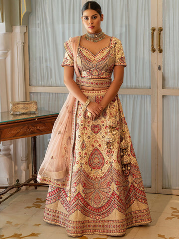 Rajasthani style Cream Colored Heavy Embroidered Lehenga Set - Rent